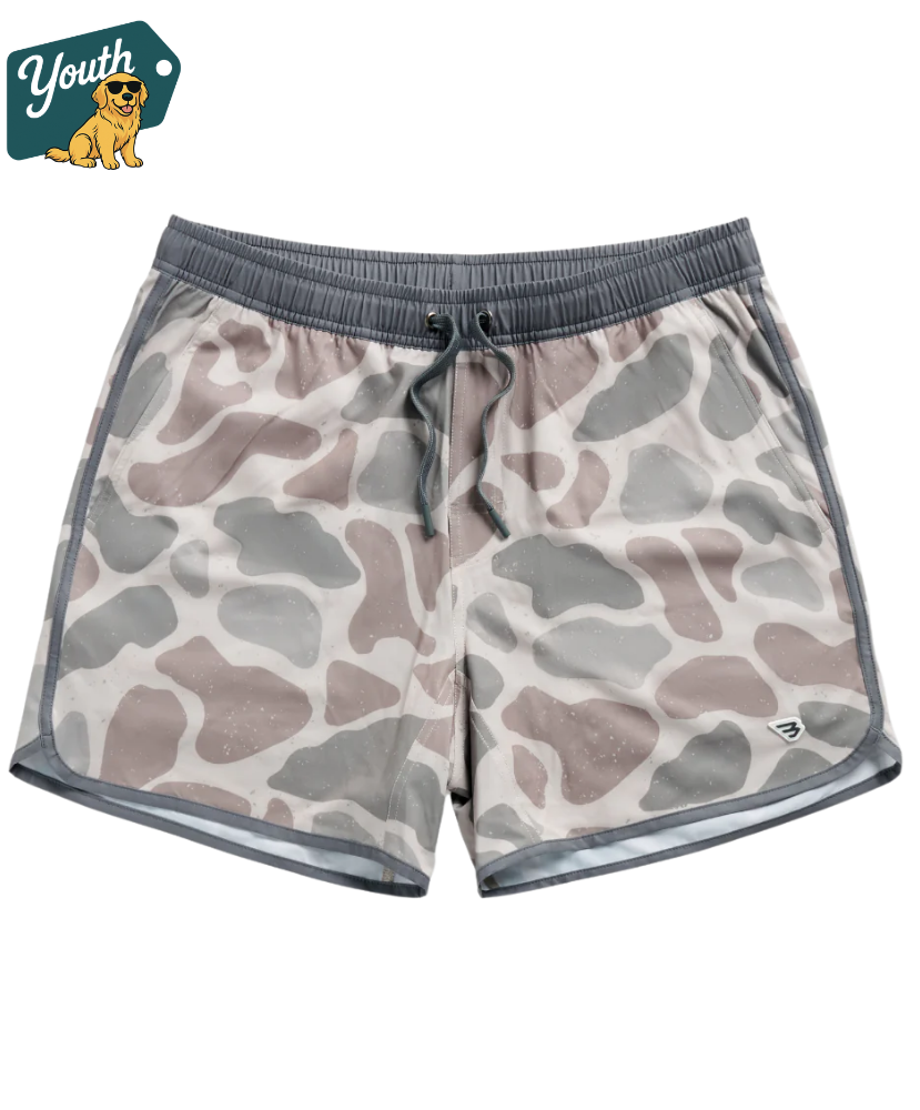 Camouflage kid's swim trunks with gray waistband on a white background, featuring a 'Youth' logo with a dog icon in the corner.
