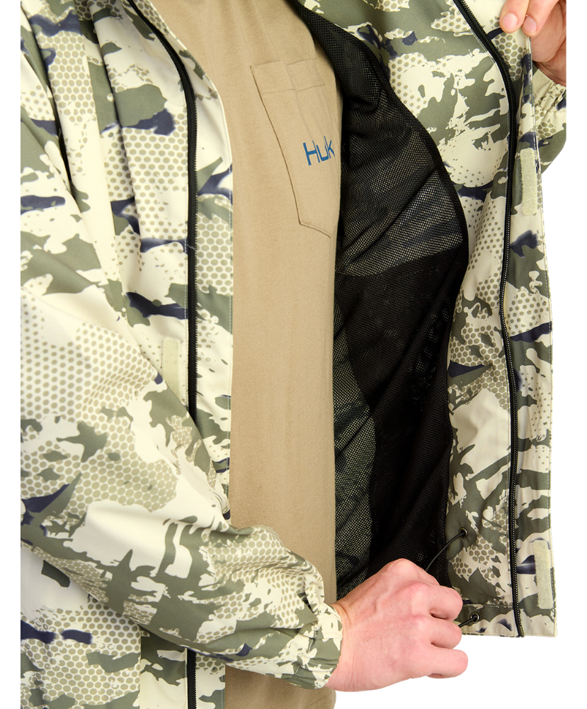 Camouflage HUK jacket with a visible brand logo on a white background
