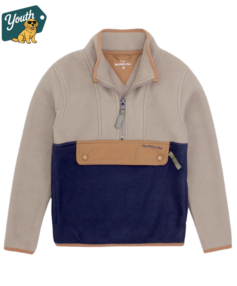 Two-tone boys pullover made by Properly Tied with beige and navy design on a white background, featuring the 'Youth' brand logo.