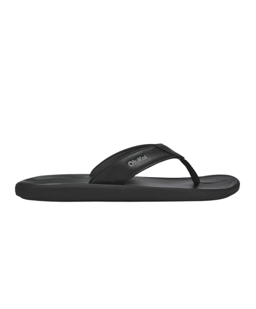 Black Olukai sandal with a on a white background