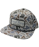 A flat-brim baseball cap with a gray, brown, and beige camouflage pattern, featuring a front patch that reads 'Local Boy OUTFITTERS'.