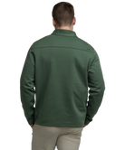 Green pullover with a plaid shirt underneath on a white background