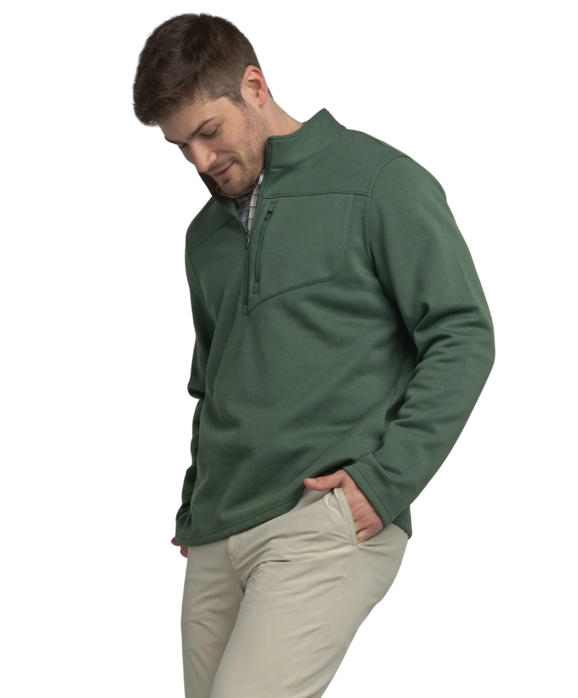 Green quarter zip pullover with a plaid shirt underneath on a white background