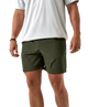 Person wearing green ATHLETIC shorts and a white t-shirt on a white background