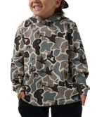 A child wearing a waffle-knit hoodie with a muted camouflage pattern in beige, gray, and black, paired with dark pants against a plain white background.