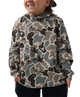 A child wearing a waffle-knit hoodie with a muted camouflage pattern in beige, gray, and black, paired with dark pants against a plain white background.