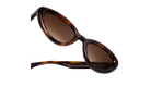 Krewe sunglasses with tortoiseshell frame and brown lenses on a white background