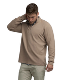 Man wearing a light brown long-sleeve quarter-zip pullover on a white background