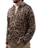 Person wearing a leopard print jacket on a white background