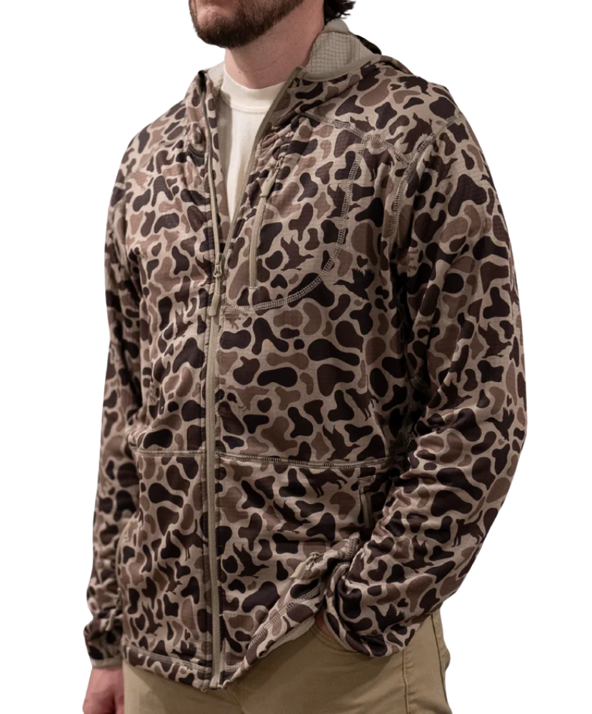 Person wearing a leopard print jacket on a white background