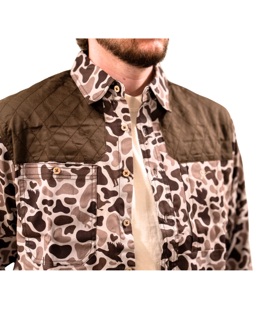 Camouflage-patterned jacket with a brown collar on a white background