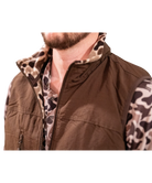 Brown vest with camouflage sleeves worn by a person on a white background