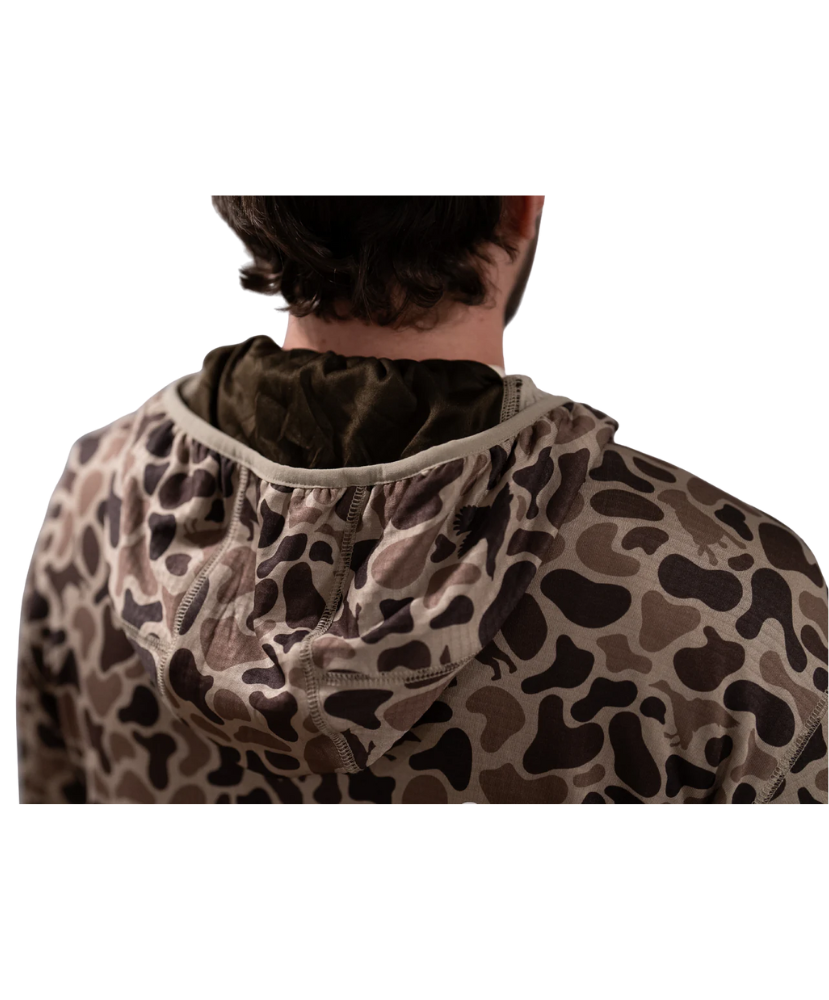 Camouflage-patterned hooded garment on a white background