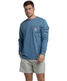 Man wearing a blue long-sleeve shirt with a logo on a white background