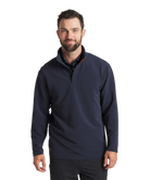 Man wearing a navy blue pullover with a white background