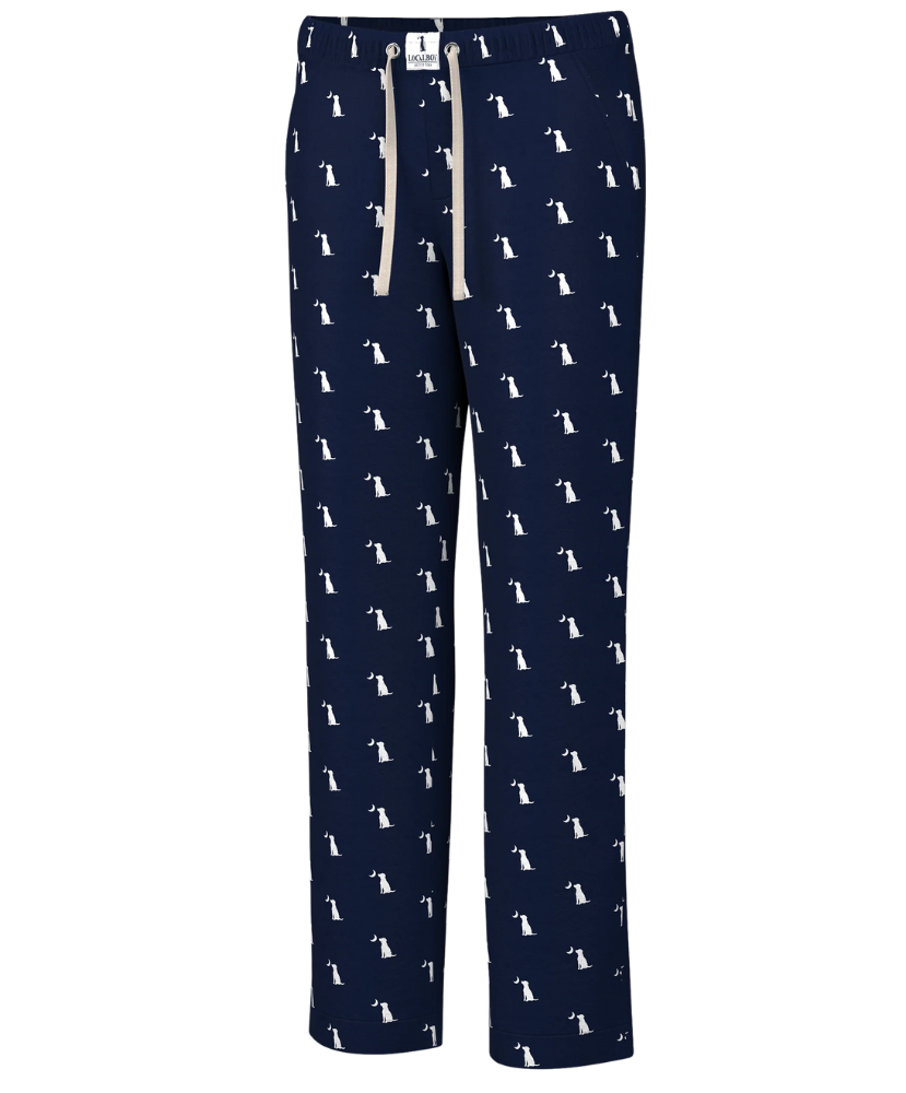 Navy blue pajama pants with white dogs pattern on a white background