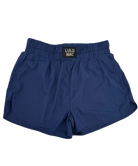 Blue shorts with a visible brand label on a white background