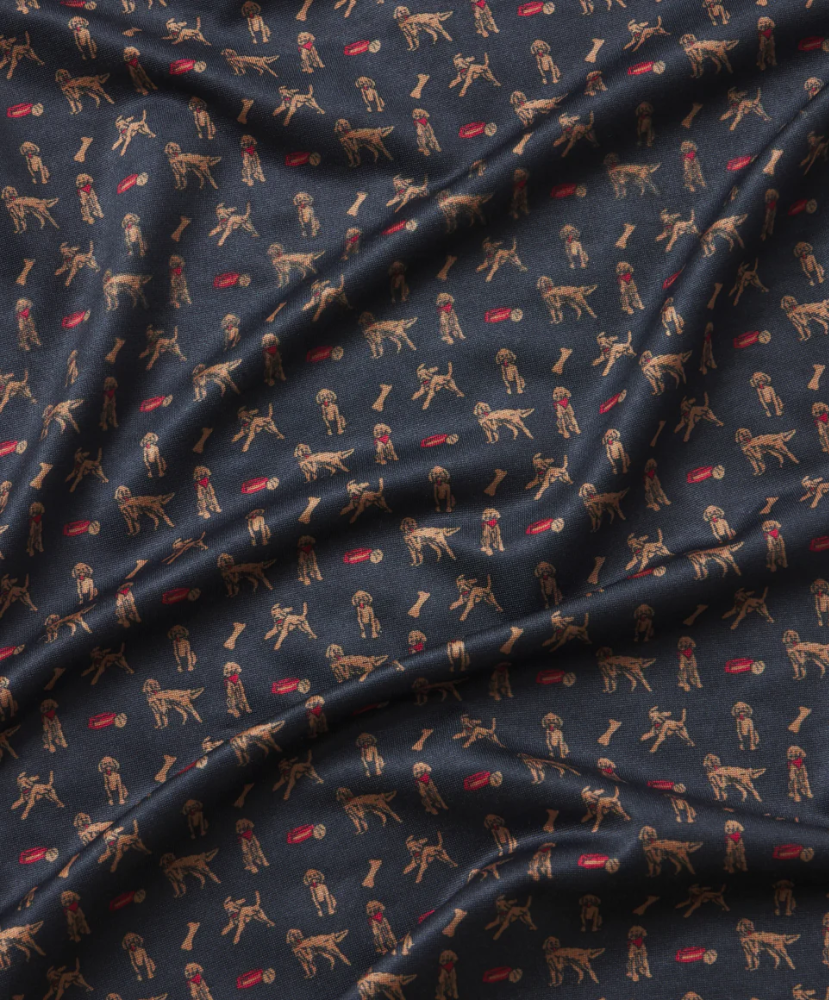 Navy polo with a golden doodle pattern prnt
