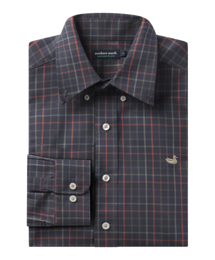 Folded plaid shirt with visible Southern Marsh brand label on a white background