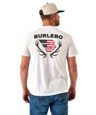 Man wearing a white t-shirt with 'Burlebo' logo on the back and elk horns, standing against a white background