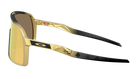 Oakley sunglasses with a gold and black gradient frame, gold mirrored lenses, and black temple arms featuring gold graphics and black pips.