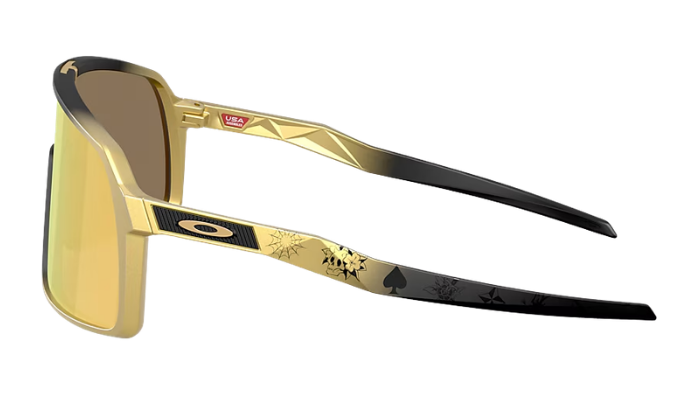 Oakley sunglasses with a gold and black gradient frame, gold mirrored lenses, and black temple arms featuring gold graphics and black pips.
