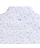 Light blue floral GOLF pattern on POLO  a white background