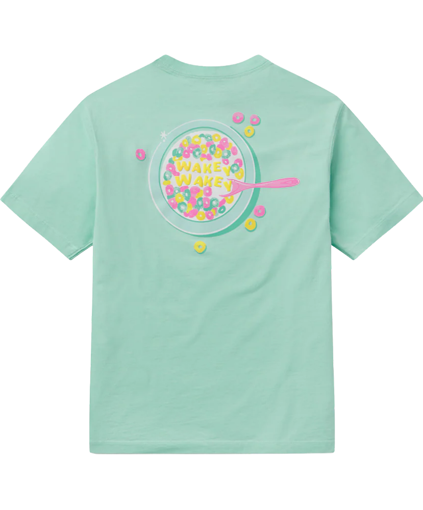 Light green t-shirt with a colorful 'Wakey Wakey' cereal bowl design on the back against a white background
