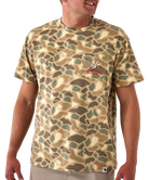 Person wearing a camouflage t-shirt with a logo on a white background