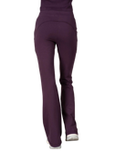 Woman wearing a purple tank and pants athleisure set outfit on a white background