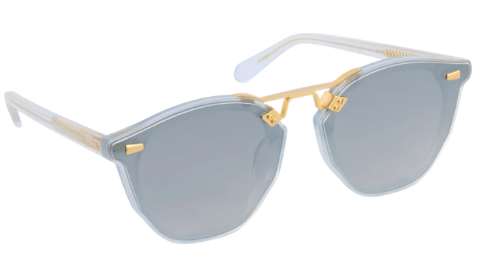 KREWE Sunglasses with gold accents and light blue lenses on a white background