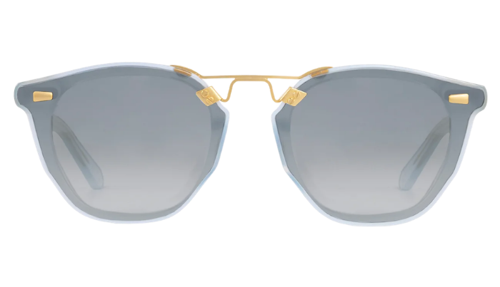 KREWE Sunglasses with gold accents and light blue lenses on a white background