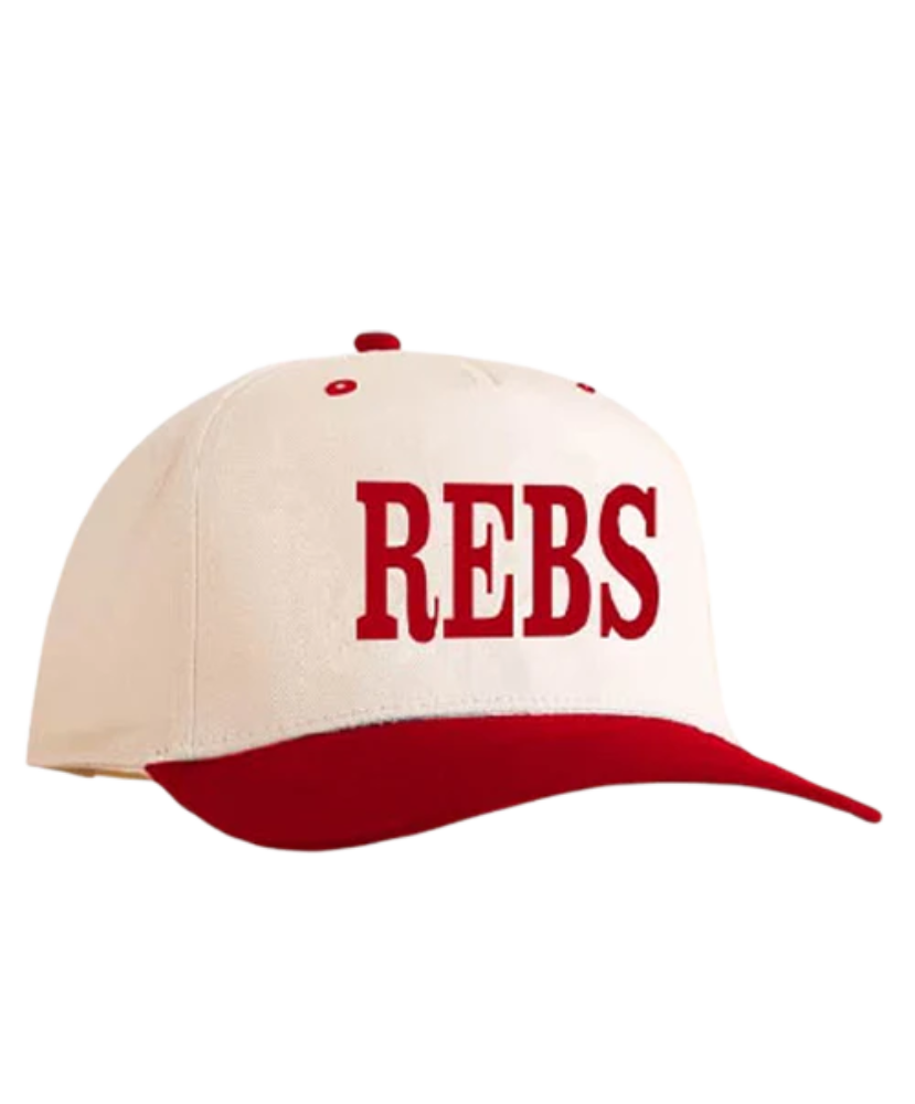 Beige and red cap with 'REBS' text on a white background