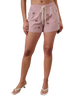 Person wearing red striped shorts with American flags on a white background