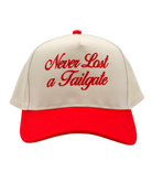 Beige and red cap with 'Never Last a Tailgate' text on a white background
