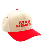 Beige and red cap with text 'PUT IT ON MY DAD'S TAB' on a white background
