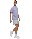 Man wearing a Southern Shirt Co light purple striped polo shirt and gray shorts on a white background
