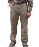 Beige pants worn by a person with a patterned shirt on a white background