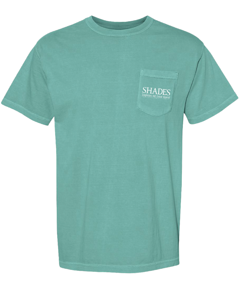 Teal t-shirt with a pocket and 'SHADES' logo on a white background