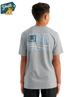 KID wearing a gray HUK t-shirt with a logo on the back, standing against a white background.