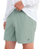Person wearing LIGHT GREEN HUK shorts on a white background