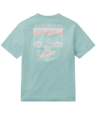 Light blue t-shirt with a graphic design OF a dog on a surfboard on the back on a white background