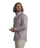Man wearing a plaid shirt on a white background