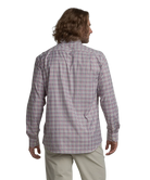 Man wearing a plaid shirt on a white background