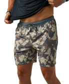 A person wearing camouflage athletic shorts and lifting a black shirt, shown from the chest to the upper thighs against a plain white background.