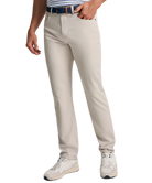 Stone Genteal pants worn by a person on a white background