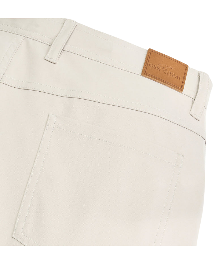 Stone Genteal pants worn by a person on a white background