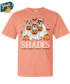 Peach t-shirt with Halloween-themed design featuring dogs in costumes and pumpkins, branded 'Youth'.