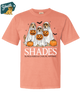 Peach t-shirt with Halloween-themed design featuring dogs in costumes and pumpkins, branded 'Youth'.