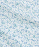 Pattern of blue shapes on a light blue background